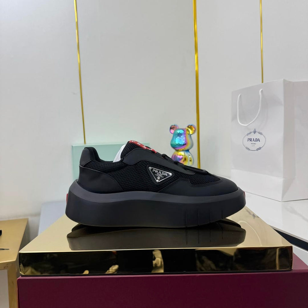 PRADA 25S CROSS LACED SNEAKERS IN BLACK CALFSKIN